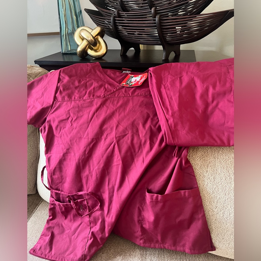 Unisex Medical Scrubs. Sold as a set with top sand bottoms. Burgundy color